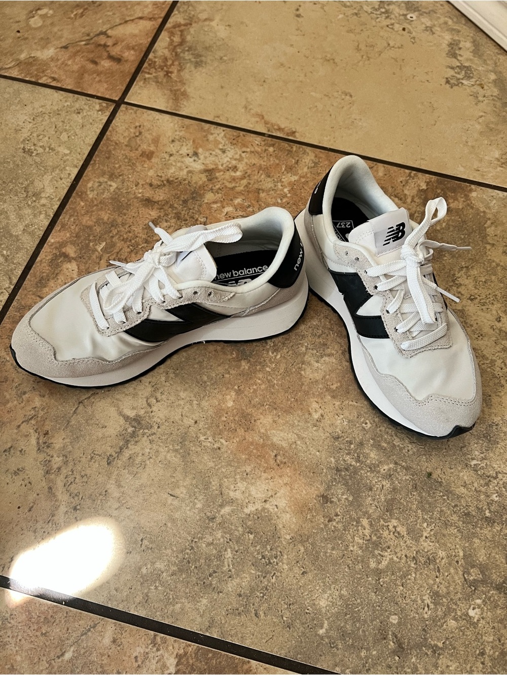 New Balance Women’s White and Black Retro-Style Sneakers